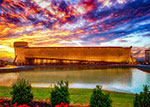 The Ark Encounter, a full-size replica of Noahs Ark, is shown at sunset. thumbnail