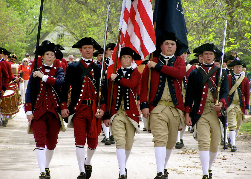 Colonial soldiers marching through Williamsburg